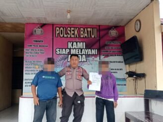 Personil Polsek Batui - Aipda Usman, bersama Pihak yang bersengketa